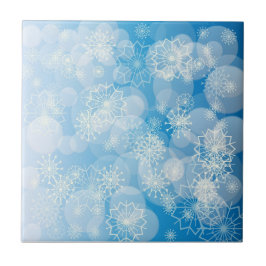 Flocos de neve de Natal em um fundo azul