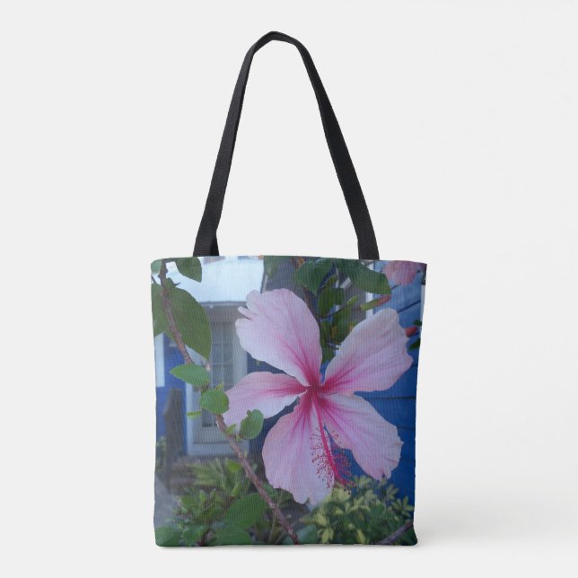 Flor de hibisco rosa e bolsa de cabana azul de pra (Verso)