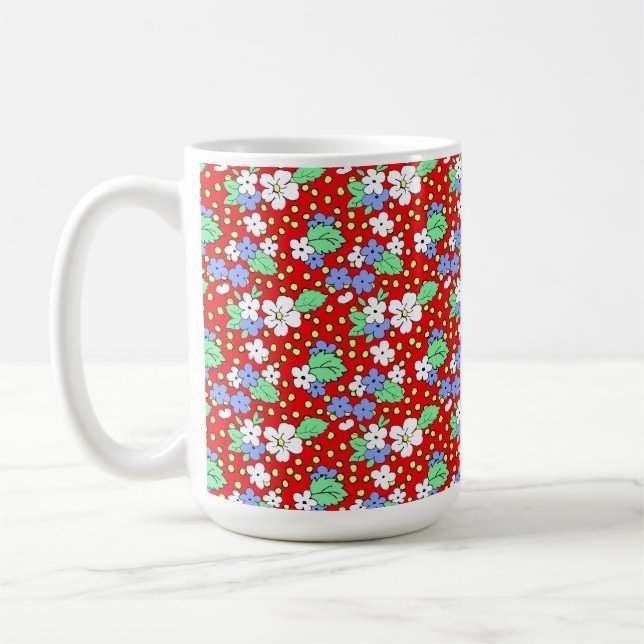 Flores brancas e azuis em caneca de café vermelha (Esquerda)