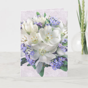 Flores da primavera. Crocuses e cartão Não-me-esqu