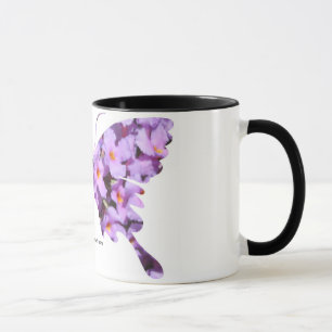 Flores do Lantana da lavanda em uma caneca de caf