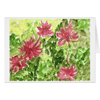 Flores fuchsia contra o cartão de posto de grama v