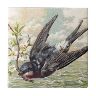 Flying swallow with flower twig