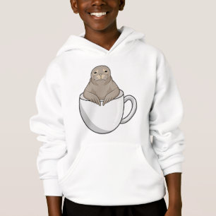 Foco com copo de café