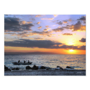 Foto Barco a remos e por do sol no oceano