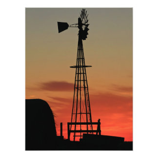 Foto da silhueta do moinho de vento ao pôr do sol 