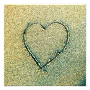 Foto do coração do desenho da areia