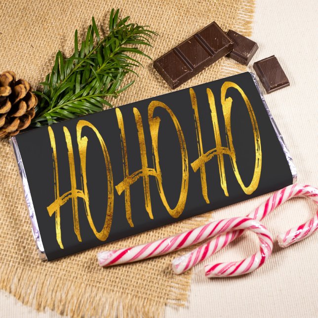 Foto invólucro de chocolate preto e ouro de natal moder (Criador carregado)