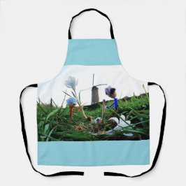 Fubby's bij een molen planten een krokus bol.