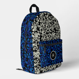 Fundo preto das flores brancas e azuis