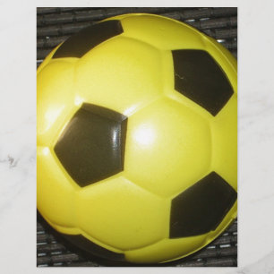 Futebol amarelo e preto.