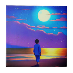 Garoto na praia, olhando na lua