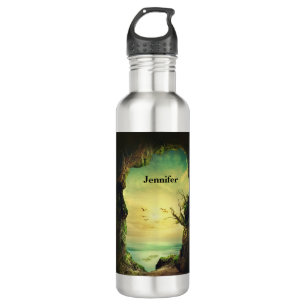 Garrafa Foto de uma caverna que se sobrepõe a um mar tropi