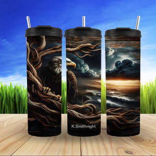 Garrafa Térmica Águia no pôr do sol sobre a costa