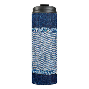 Garrafa Térmica Encaixe o quadro do tecido de jeans azuis. Fabr de
