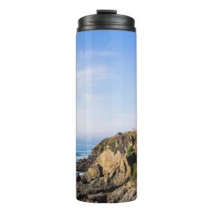 Garrafa Térmica Farol na colina céu azul casa branca oceano