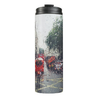 GARRAFA TÉRMICA FOTO DO ÔNIBUS VERMELHO NA RUA DA JANELA