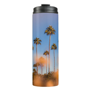Garrafa Térmica Palmeira sob céu azul