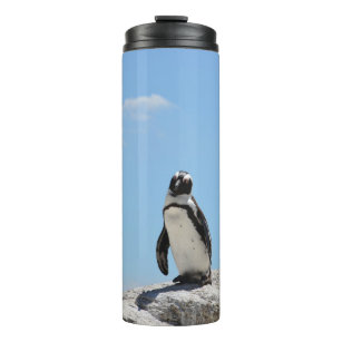 Garrafa Térmica Pinguim-branco-solteiro e céu azul