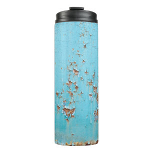 Garrafa Térmica Rusted Blue Metal: Muro Texturizado.
