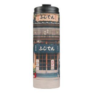 GARRAFA TÉRMICA TRÊS BICICLETAS ESTACIONADAS NA FRENTE DA CONSTRU