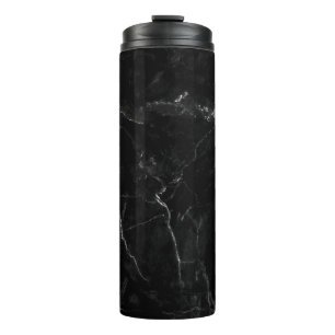 Garrafa Térmica Tumbido de aço sem manchas preto no mármore