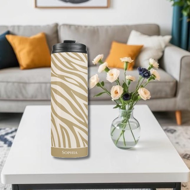 Garrafa Térmica Zebra Print-Beige (Sip in Style with Our Neutral Zebra Print Thermal Tumbler – Where Chic Meets Function.
Stay hydrated)