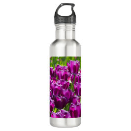 Garrafa Tulipas lilás brilhantes num dia ensolarado