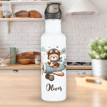 Garrafa Urso de Teddy Piloto Cute Personalizado<br><div class="desc">Esta adorável garrafa de água personalizada apresenta um ursinho de pelúcia branco,  tudo pronto para a aventura! Apelido de chapéu piloto e cachecol,  o urso fofinho voa num charmoso avião,  voando entre nuvens fofinhas e estrelas cintilantes.</div>