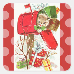 Gatinho do vintage na etiqueta do Natal da caixa