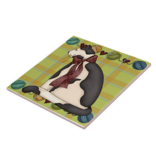 Gatinho na Trivet do Azulejo de Xadrez