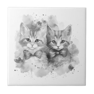 Gatinhos pretos e brancos com laços e borboletas