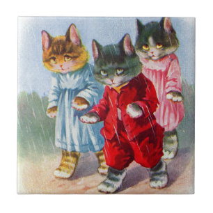 Gatinhos vestidos na chuva nos anos 30