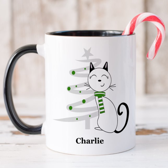 Gato bonito com caneca de Natal verde (Criador carregado)