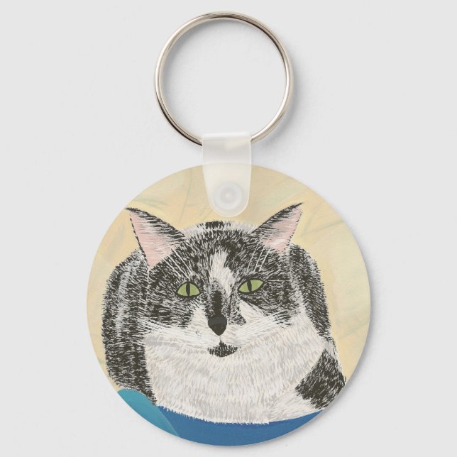 Gato preto e brancoTuxedo sobre chaveiro azul (Frente)