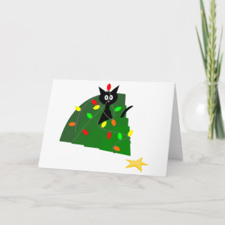 Gato preto engraçado no cartão de Natal da árvore