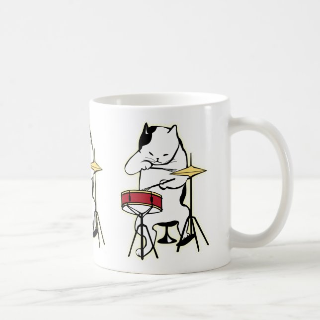 Gato que joga a caneca dos cilindros (Direita)