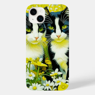 Gatos adoráveis sentados em um campo de Margaridas