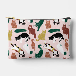 Gatos encantadores desenhados à mão em fundo rosa