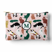 Gatos encantadores desenhados à mão em fundo rosa