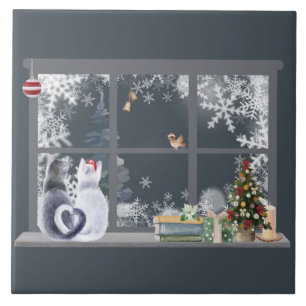 Gatos na janela de Natal