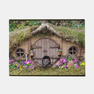 George, o tapete da porta do rato