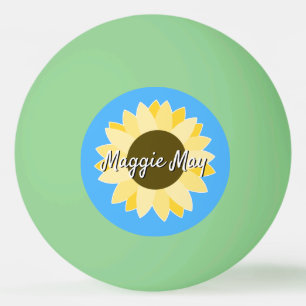 Girassóis na bola de pingue-pongue azul