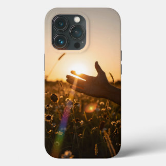 Golden Hour — Hand Reaching for the Setting Sun