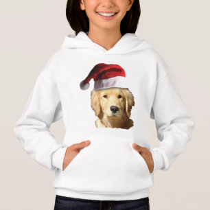 Golden retriever que veste um chapéu de Papai Noe