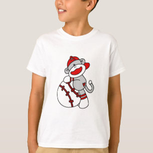 Golpeie o macaco com as camisas e os presentes do