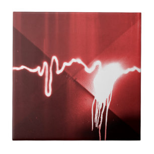grafite pulverizado em metal vermelho