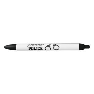Gramática Policial tem caneta de tinta vermelha e