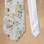 Gravata Monograma impresso sobre vida lisa floral colorida<br><div class="desc">Esta é uma gravata de tamanho padrão com um padrão floral colorido com fundo de cor platina. Altere facilmente as iniciais sutis, impressas em monograma, utilizando o Modelo fornecido. [O monograma será centrado e hetero, ao contrário da fotografia mock-up.] As dimensões têm 55" de comprimento, 4" no ponto mais largo,...</div>
