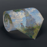 Gravata Mulher com parasol Claude Monet<br><div class="desc">Mulher com um parasol - a senhora Monet e seu filho por Claude Monet, óleo nas canvas 1875, é uma pintura de uma mulher em um vestido branco que guardara um guarda-chuva sobre sua cabeça em cima da parte superior de um monte coberto na grama e nos wildflowers, backlit contra...</div>